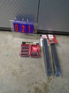 Qty of 2 Craftsman tool box drawer dividers with 29 piece bit set. As shown.