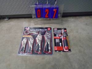 Package of new locking pliers & screw drivers. As shown.