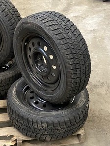 lot 14 image: (4) Bridgestone Tires & Wheels