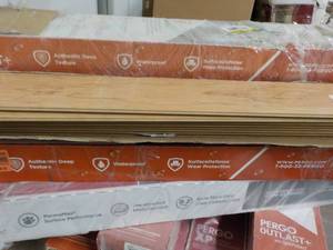 lot 260 image: 8 Cases Pergo misc. Flooring...