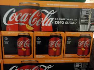 lot 261 image: 4 - 12 packs Coca Cola Orange Vanil...