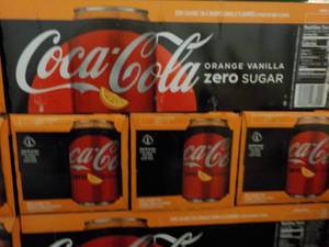 lot 263 image: 4 - 12 packs Coca Cola Orange Vanil...
