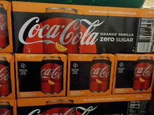 lot 264 image: 4 - 12 packs Coca Cola Orange Vanil...
