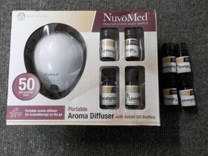 lot 36 image: Nuvo Med Portable Aroma Diffuser wi...