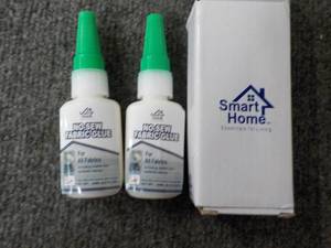 lot 68 image: 2 Bottles No Sew Fabric Glue...