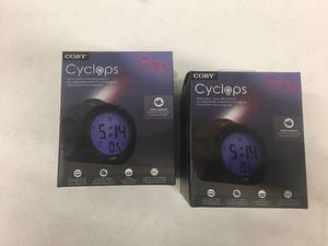 lot 128 image: Brand New Lot of TWO Coby Cyclops LED Talking Alarm Clocks