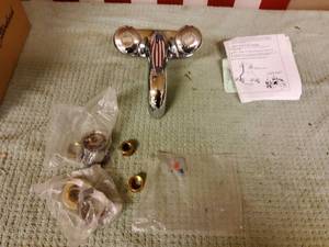 lot 73 image: American standard, center set faucet, VR 0.5 GPM, Chrome