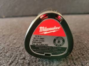 lot 26 image: Milwaukee M12 Red Lithium Battery (New)