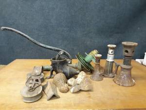 lot 121 image: Antique Sausage Stuffer, Clawfoot Tub Legs, Pulleys, Screw Jacks and More - NO SHIPPING