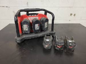 lot 195 image: Milwaukee Multi-bay Charger for 18V Batteries - Includes (6) Batteries of unknown condition - NO SHIPPING