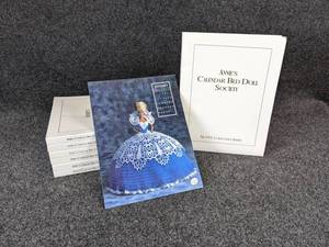lot 220 image: Annies Calendar Bed Doll Society Collector Series - 1991 to 1996