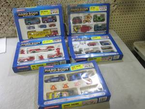 lot 16 image: (F-0) Lot of 5 Tootsie Toy Hard Bod...