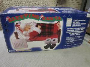 lot 101 image: (EW4) Animated Sleeping Santa...