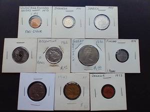 lot 64 image: 10 Foreign Coins in 2X2 Sleeves