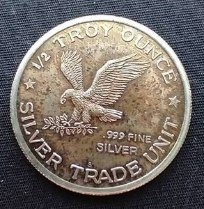 lot 75 image: 1986 12 Ounce Silver Coin