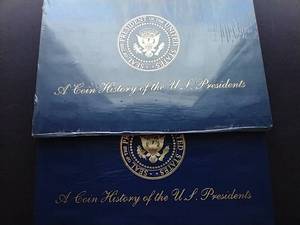lot 91 image: 2 Albums of US Presidents Coins