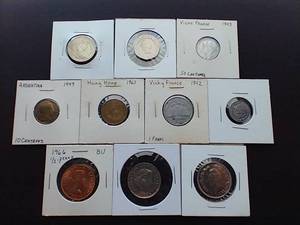 lot 97 image: 10 Foreign Coins in 2X2 Sleeves