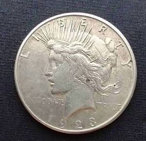 lot 104 image: 1923-S Peace Dollar