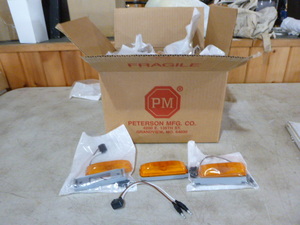 lot 108 image: Case of PM Amber Marker Lights