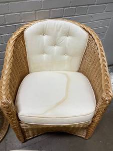 lot 49 image: Pr Two McGuire Armchairs and Ottomans and Sidetable