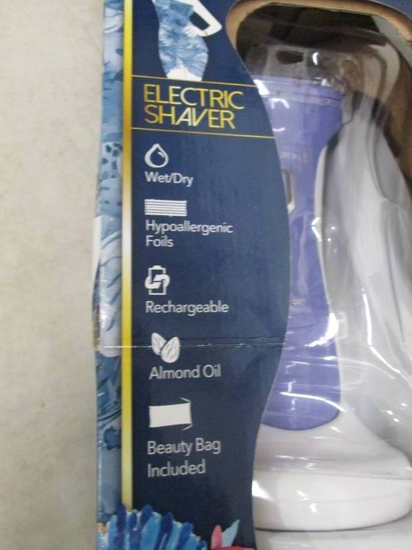 reminton electric shaver purple and...