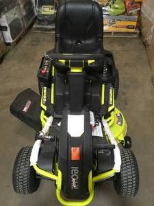 Ryobi 48V Brushless 38 in. 75 Ah Battery Electric Rear Engine Riding Lawn Mower customer return in working condition see pictures