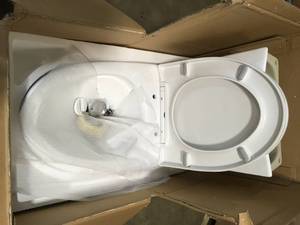 Swiss Madison St. Tropez 1-Piece 0.81.28 GPF Dual Flush Elongated Toilet in White not used see pictures