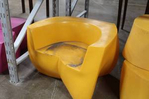 lot 551 image: Yellow Plastic Chair
