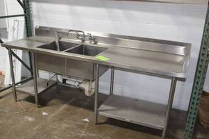 lot 52 image: NSF Stainless Steel Commercial Dual Sink with Fixtures, Counter and Shelf