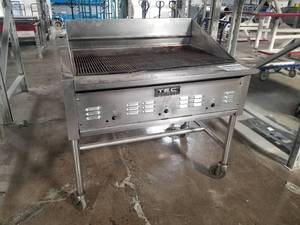 lot 41 image: TEC Stainless Steel Gas Grill on Wheels