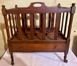 lot 114 image: Magazine Rack on Casters