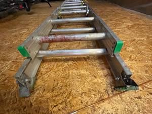 lot 210 image: Kellor Aluminum 24 Foot Extension Ladder