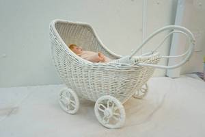 lot 147 image: Wicker Buggy ,Doll