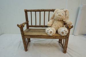 lot 172 image: handmade wood bench with bear