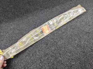 lot 1536 image: NOS - 1971-72 Suzuki TS185 Muffler Cover - Part No. 14780-29001