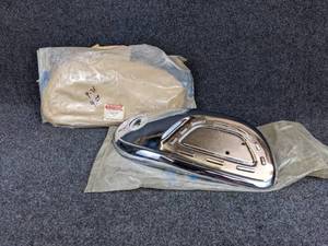 lot 1515 image: NOS - Suzuki Motorcycle LH & RH Side Fuel Tank Covers - Part No. 44170-11000 and 44180-11000