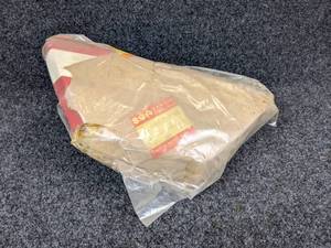 lot 1525 image: NOS - 1972 Suzuki TS185 Frame Cover - Part No. 47211-29600