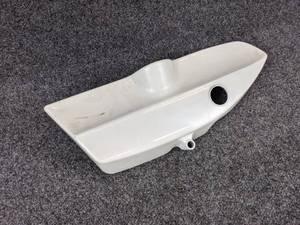 lot 1521 image: NOS - 1973 Suzuki MT50 RH Side Cover - Part No. 47111-27000