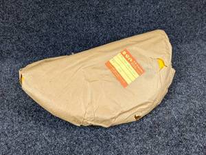 lot 1526 image: NOS - 1973-76 Suzuki TS185 Motorcycle Plastic LH Side Cover - Part No. 47211-29610