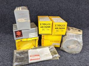 lot 1531 image: NOS - (Lot of 9) Vintage Suzuki Motorcycle Air Filters - Part No. (2) 12-94000, 1010, 00041-01570, 00041-01556, 13780-16511, (2) 13780-01010 and 13781-47030