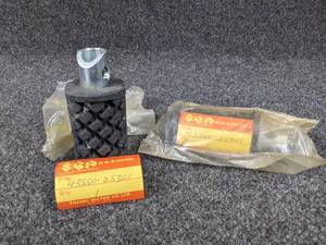 lot 1583 image: NOS - (Lot of 2) 1971-77 Suzuki Foot Rest Pegs, Part No. 43550-25301