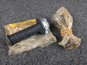 lot 1550 image: NOS - (Lot of 2) 1971-75 Suzuki TM400 Handle Switch Grips - Part No. 57100-16510