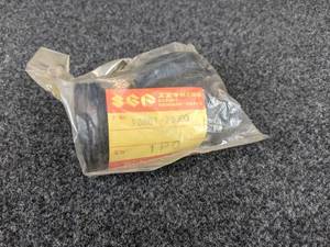 lot 1571 image: NOS - 1971-76 Suzuki TS50 & TM75 Air Cleaner Tube - Part No. 13881-26000