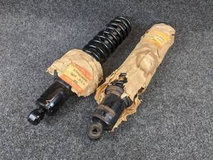 lot 1597 image: NOS - (Lot of 2) 1976-78 Suzuki RM250 & RM370 Rear Shock Assembly, Part No. 62100-41110