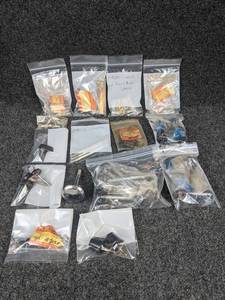 lot 1592 image: Large Lot of Vintage Suzuki Studs, Spacers and More