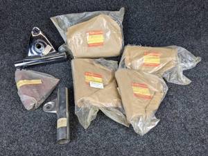 lot 1598 image: NOS - Lot of Vintage Suzuki Headlamp Brackets, Part No. 51540-33000-215, 51540-28600, 51540-30611, 51530-33110 & 51540-10011