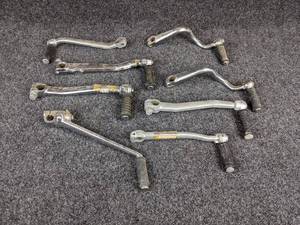 lot 1608 image: (Lot of 8) Assorted Vintage Suzuki Kick Start Levers