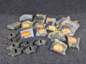lot 1612 image: Large NOS Lot of Vintage Suzuki Wheel Hub Shock Absorbers - See Pictures for Part Numbers