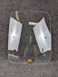 lot 1624 image: NOS Arthur Fulmer Windshield - Measures about 19 x 16 Wide