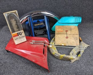 lot 1616 image: Large Lot of Vintage Suzuki Parts